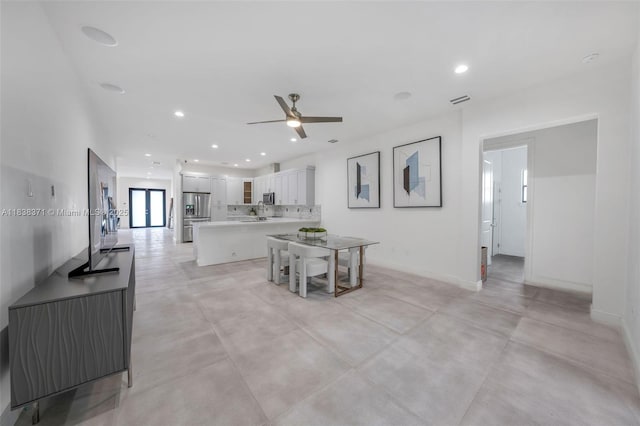 14832 SW 39th Ter, Miami, FL 33185 - living room with a ceiling fan, recessed lighting, and concrete flooring