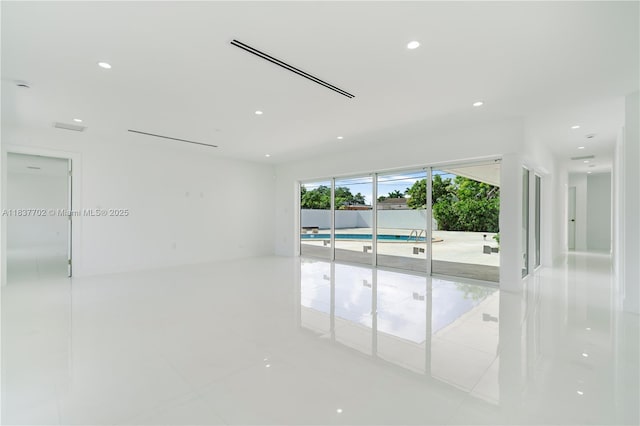 9800 SW 159th St, Miami, FL 33157 - tiled empty room featuring recessed lighting