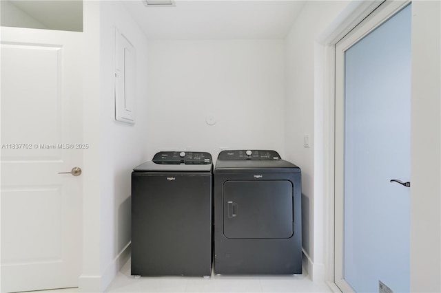 9800 SW 159th St, Miami, FL 33157 - laundry area with washing machine and clothes dryer and baseboards