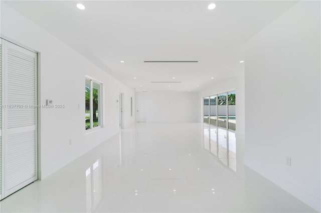 9800 SW 159th St, Miami, FL 33157 - corridor with plenty of natural light, recessed lighting, and tile patterned floors