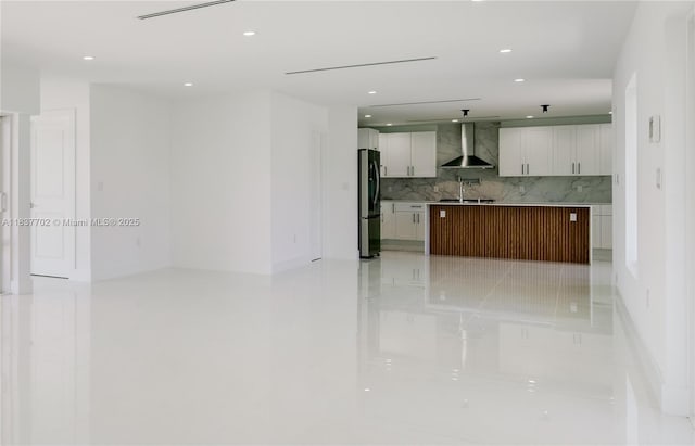9800 SW 159th St, Miami, FL 33157 - kitchen with wall chimney range hood, freestanding refrigerator, tasteful backsplash, recessed lighting, and white cabinets