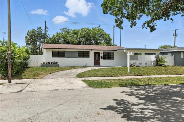 6424 Pierce St, Hollywood, FL 33024 - ranch-style house featuring stucco siding and driveway