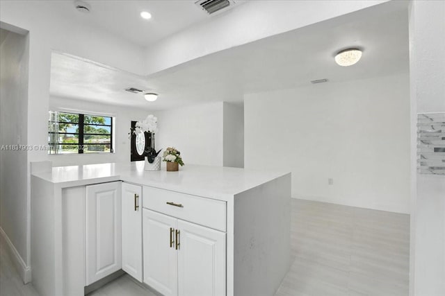 6424 Pierce St, Hollywood, FL 33024 - kitchen featuring light countertops and white cabinetry