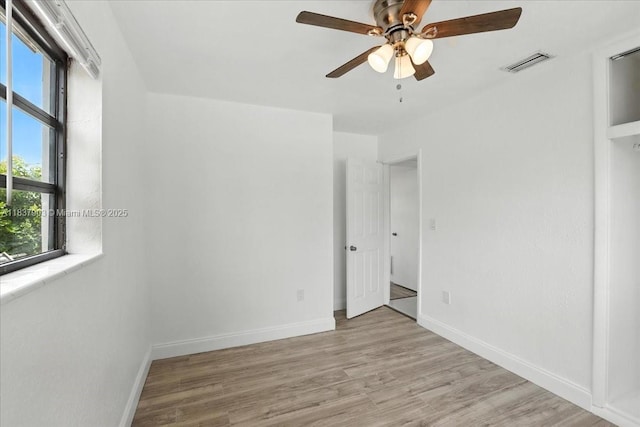 6424 Pierce St, Hollywood, FL 33024 - unfurnished bedroom with light wood-style flooring and a ceiling fan