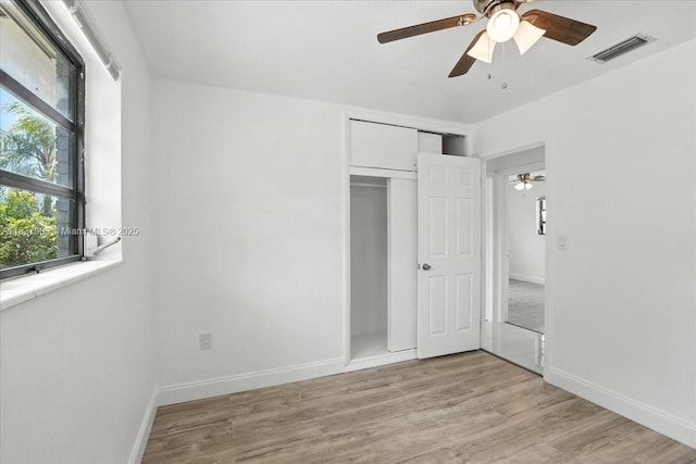 6424 Pierce St, Hollywood, FL 33024 - unfurnished bedroom featuring light wood finished floors, a closet, and a ceiling fan