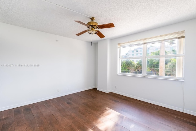 10140 W Bay Harbor Dr Unit 201A, Bay Harbor Islands, FL 33154 - unfurnished room with a ceiling fan, dark wood-type flooring, and a textured ceiling