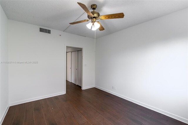 10140 W Bay Harbor Dr Unit 201A, Bay Harbor Islands, FL 33154 - unfurnished room with a ceiling fan and dark wood-style floors
