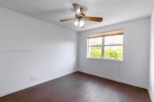 10140 W Bay Harbor Dr Unit 201A, Bay Harbor Islands, FL 33154 - unfurnished room with dark wood-style floors, a textured ceiling, and ceiling fan
