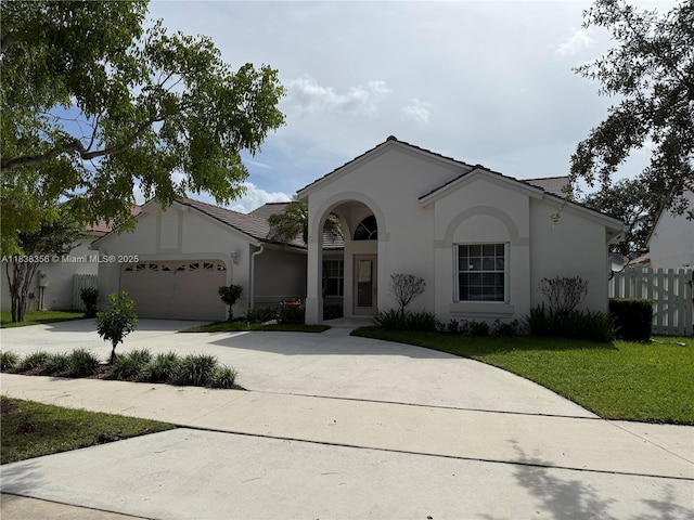 794 Lake Blvd, Weston, FL 33326 - view of front of house featuring stucco siding, concrete driveway, and an attached garage