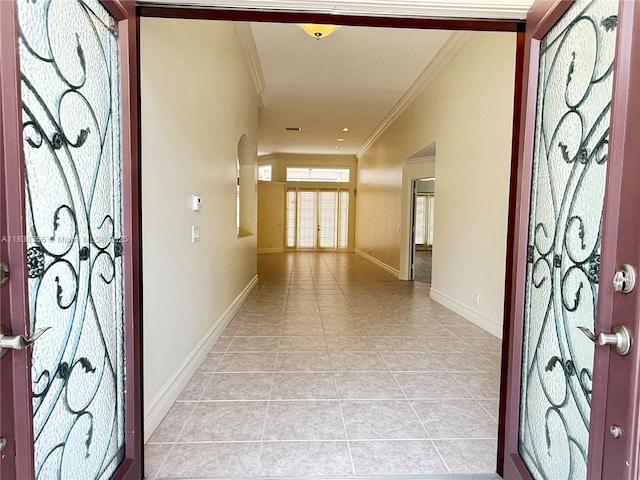 794 Lake Blvd, Weston, FL 33326 - entryway featuring ornamental molding, light tile patterned floors, and arched walkways