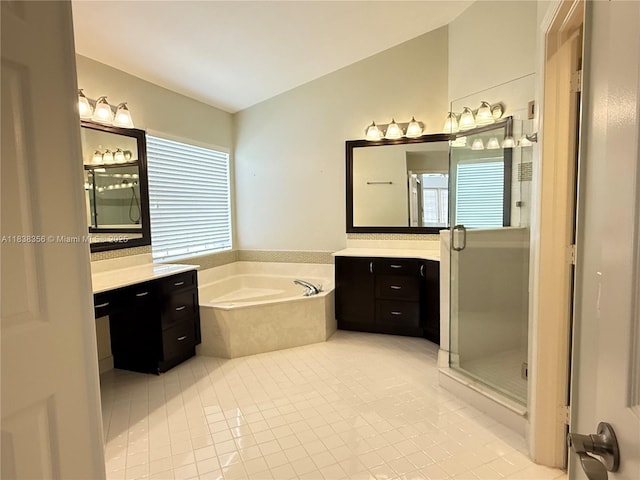 794 Lake Blvd, Weston, FL 33326 - full bathroom featuring a garden tub, tile patterned floors, vanity, vaulted ceiling, and a shower stall