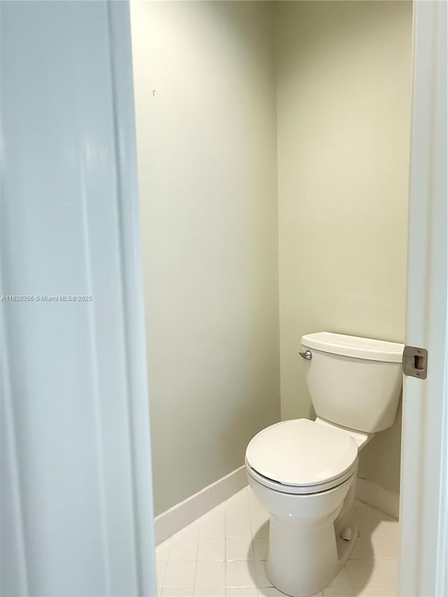 794 Lake Blvd, Weston, FL 33326 - bathroom featuring baseboards and tile patterned floors