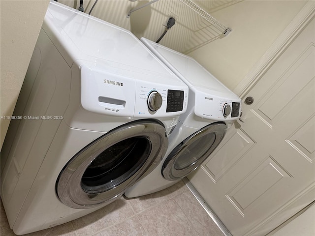 794 Lake Blvd, Weston, FL 33326 - washroom with separate washer and dryer and light tile patterned floors