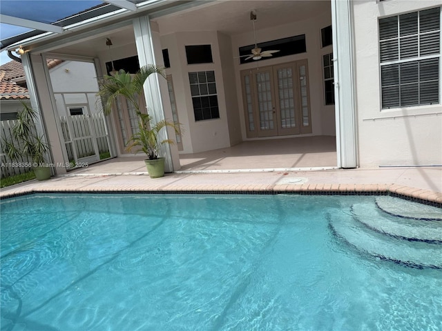 794 Lake Blvd, Weston, FL 33326 - swimming pool with french doors, ceiling fan, a patio, and glass enclosure