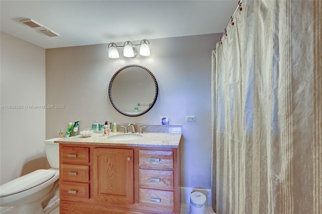 23344 Carolwood Ln Unit 303, Boca Raton, FL 33428 - bathroom with vanity and toilet