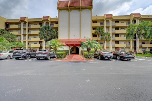 23344 Carolwood Ln Unit 303, Boca Raton, FL 33428 - view of apartment building / complex with uncovered parking