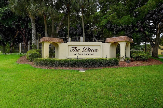 23344 Carolwood Ln Unit 303, Boca Raton, FL 33428 - community / neighborhood sign featuring a yard and view of wooded area