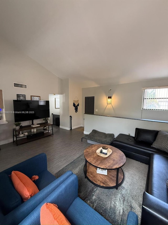 575 W Park Dr Unit 202, Miami, FL 33172 - living room featuring wood finished floors and vaulted ceiling