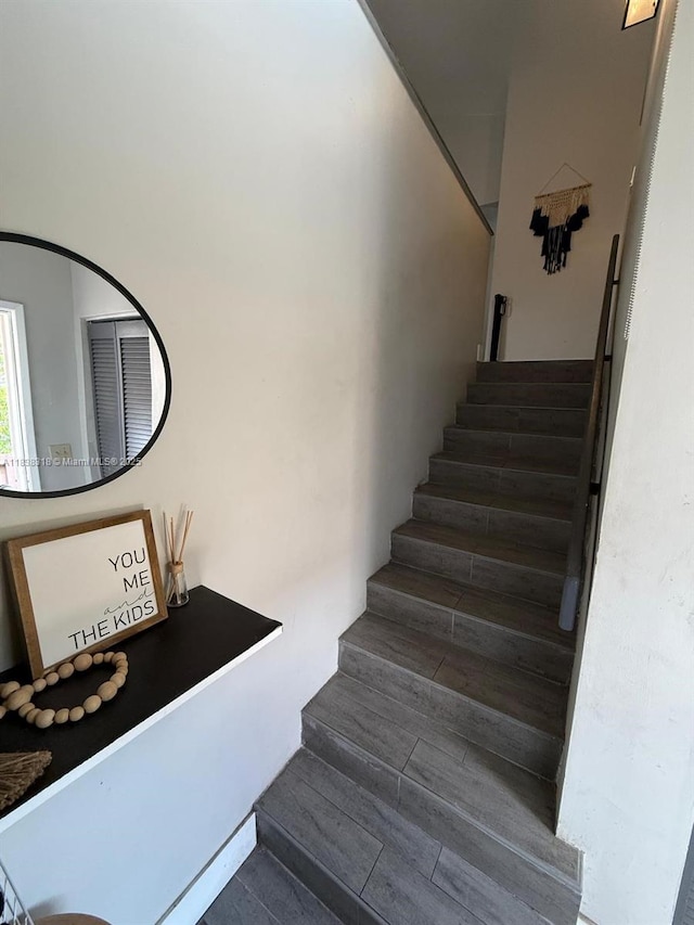 575 W Park Dr Unit 202, Miami, FL 33172 - stairway featuring wood finished floors