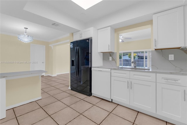 1900 N 31st Ave, Hollywood, FL 33021 - kitchen with black refrigerator with ice dispenser, dishwasher, white cabinets, light tile patterned floors, and ornamental molding