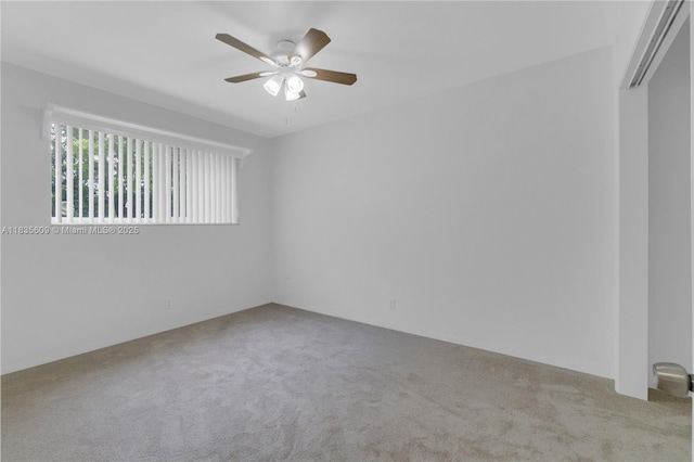 1900 N 31st Ave, Hollywood, FL 33021 - carpeted empty room with a ceiling fan