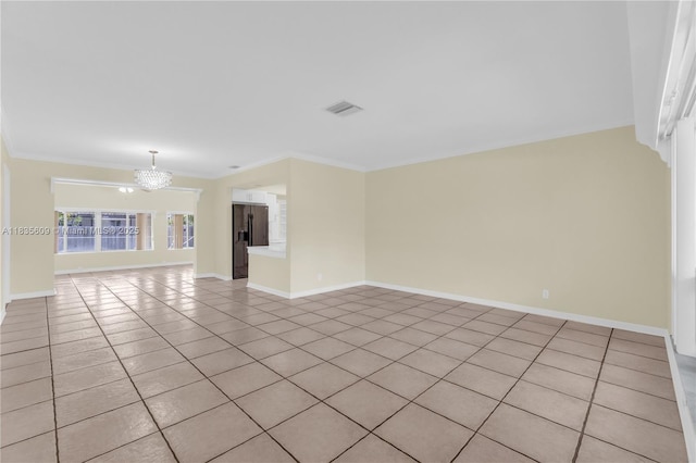 1900 N 31st Ave, Hollywood, FL 33021 - spare room with a chandelier, light tile patterned flooring, and ornamental molding