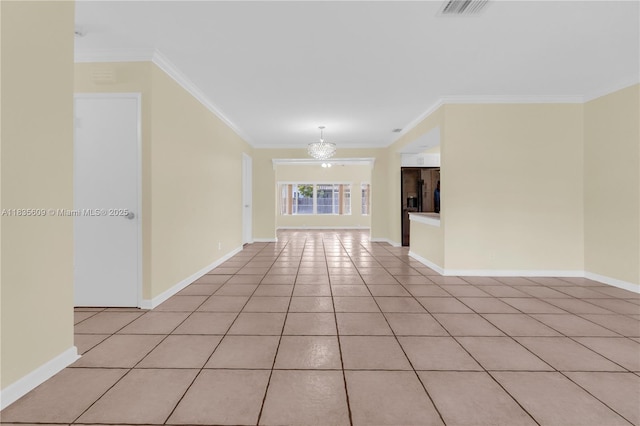 1900 N 31st Ave, Hollywood, FL 33021 - empty room with ornamental molding, a chandelier, and light tile patterned flooring