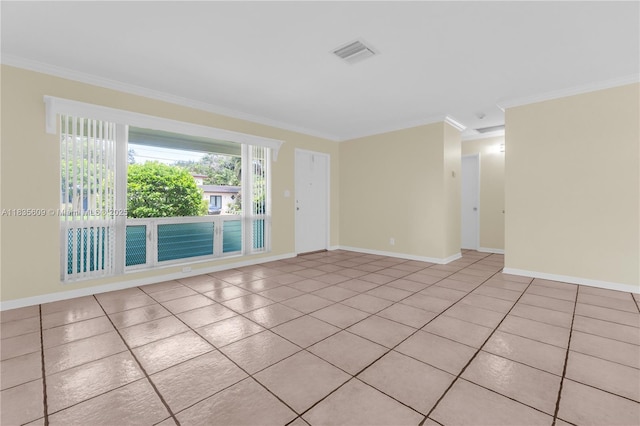 1900 N 31st Ave, Hollywood, FL 33021 - empty room with crown molding and light tile patterned floors