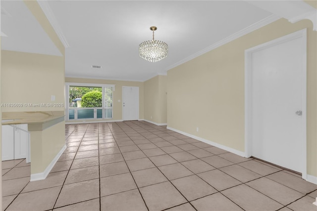 1900 N 31st Ave, Hollywood, FL 33021 - spare room with a chandelier, ornamental molding, and light tile patterned flooring