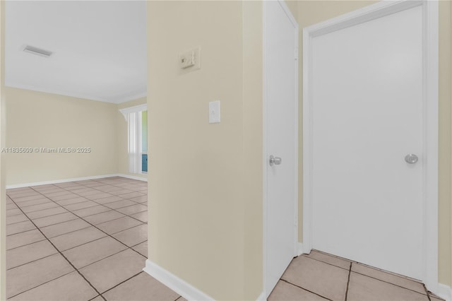 1900 N 31st Ave, Hollywood, FL 33021 - hallway featuring light tile patterned floors and baseboards