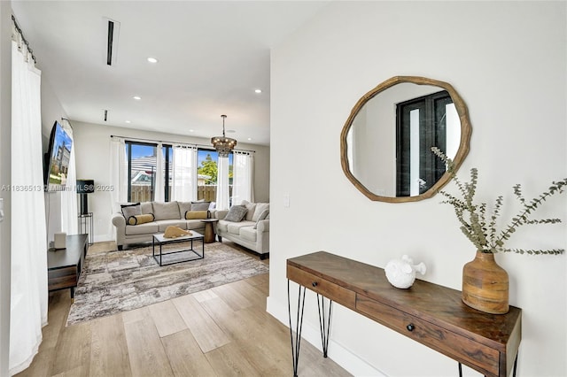 1617 NE 11th St Unit 1, Fort Lauderdale, FL 33304 - living room with light wood-type flooring and recessed lighting