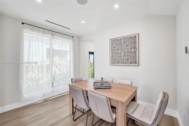 1617 NE 11th St Unit 1, Fort Lauderdale, FL 33304 - dining space featuring light wood-type flooring, recessed lighting, and lofted ceiling