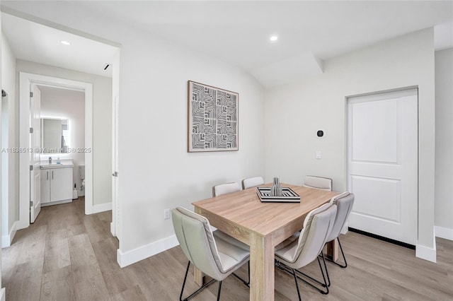 1617 NE 11th St Unit 1, Fort Lauderdale, FL 33304 - dining area with light wood-style floors and recessed lighting