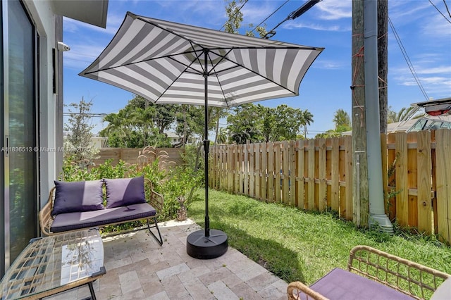 1617 NE 11th St Unit 1, Fort Lauderdale, FL 33304 - fenced backyard with a patio area