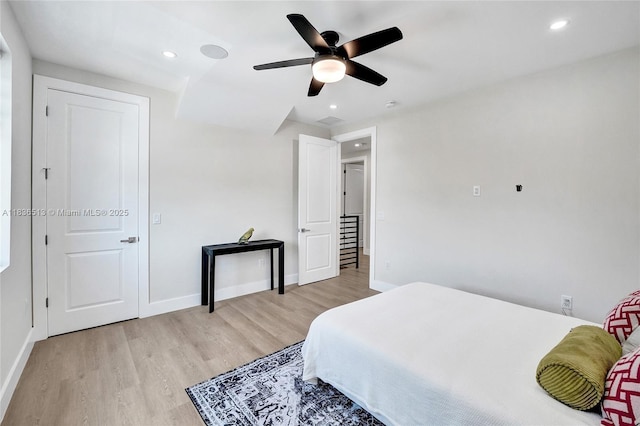 1617 NE 11th St Unit 1, Fort Lauderdale, FL 33304 - bedroom featuring light wood-style flooring, recessed lighting, and a ceiling fan