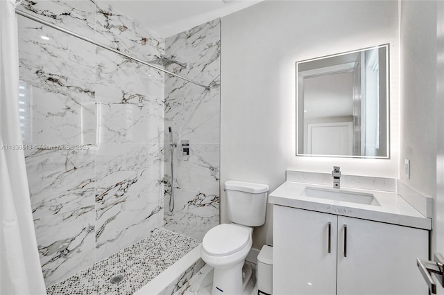 1617 NE 11th St Unit 1, Fort Lauderdale, FL 33304 - bathroom featuring vanity and a marble finish shower