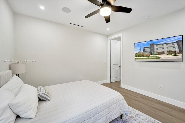 1617 NE 11th St Unit 1, Fort Lauderdale, FL 33304 - bedroom featuring wood finished floors, recessed lighting, and ceiling fan