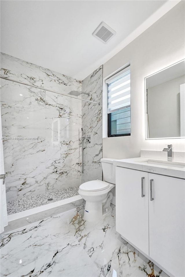 1617 NE 11th St Unit 1, Fort Lauderdale, FL 33304 - full bathroom with vanity, a marble finish shower, and marble finish floors