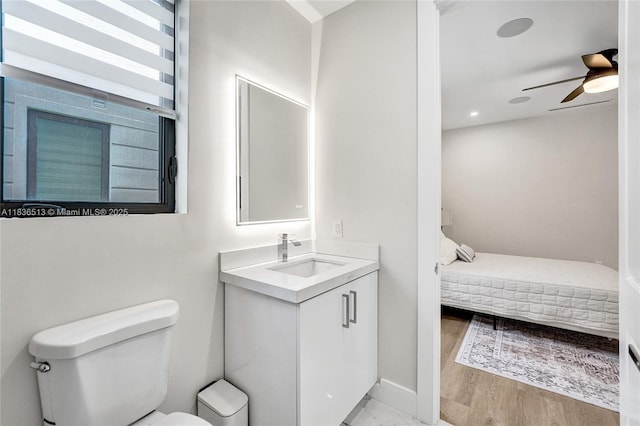 1617 NE 11th St Unit 1, Fort Lauderdale, FL 33304 - bathroom featuring vanity, ceiling fan, and wood finished floors