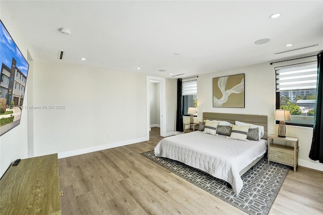 1617 NE 11th St Unit 1, Fort Lauderdale, FL 33304 - bedroom featuring light wood-style floors and recessed lighting