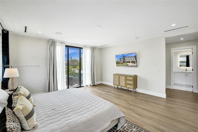 1617 NE 11th St Unit 1, Fort Lauderdale, FL 33304 - bedroom featuring light wood finished floors and recessed lighting