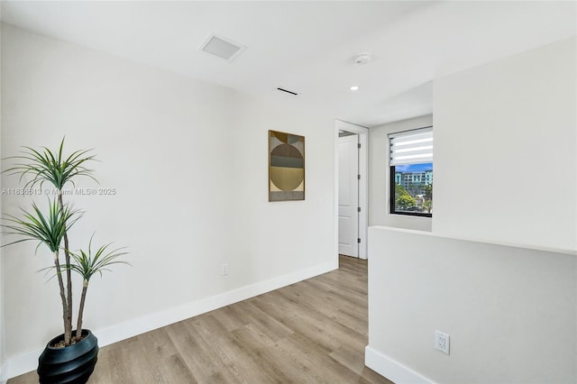1617 NE 11th St Unit 1, Fort Lauderdale, FL 33304 - unfurnished room with wood finished floors, recessed lighting, and a smoke detector