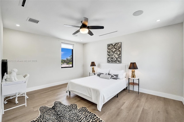 1617 NE 11th St Unit 1, Fort Lauderdale, FL 33304 - bedroom featuring wood finished floors, a ceiling fan, and recessed lighting
