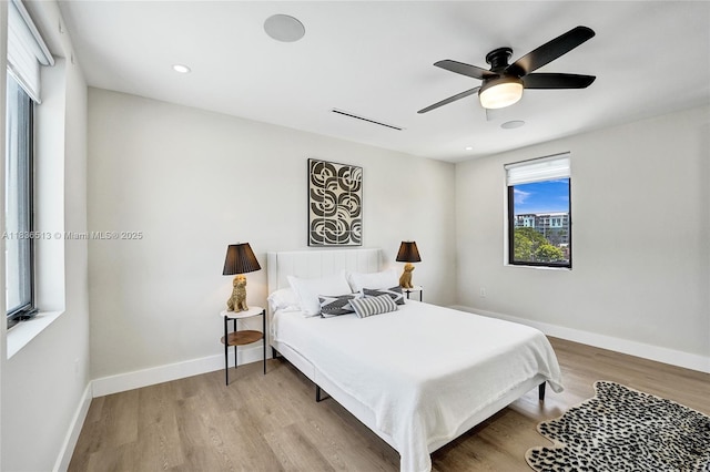 1617 NE 11th St Unit 1, Fort Lauderdale, FL 33304 - bedroom with light wood-style flooring, recessed lighting, and ceiling fan