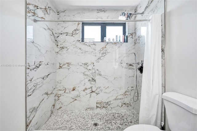 1617 NE 11th St Unit 1, Fort Lauderdale, FL 33304 - bathroom featuring a marble finish shower