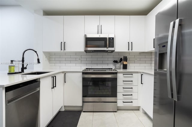 724 SW 106th Ave Unit 2010, Pembroke Pines, FL 33025 - kitchen featuring appliances with stainless steel finishes, light countertops, and backsplash