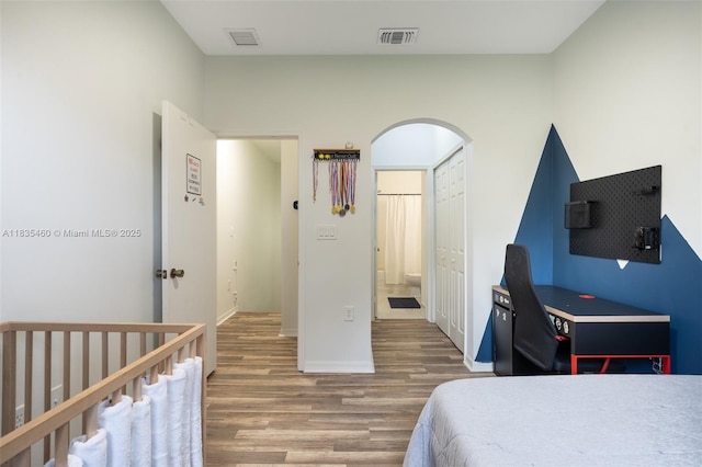 724 SW 106th Ave Unit 2010, Pembroke Pines, FL 33025 - bedroom with wood finished floors and arched walkways