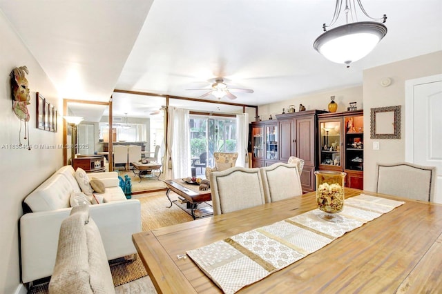 9715 NW 23rd Ct, Pembroke Pines, FL 33024 - dining area with a ceiling fan and light wood-style flooring