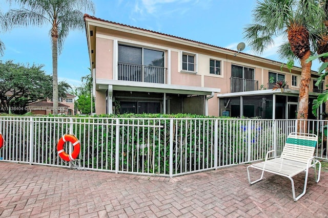 9715 NW 23rd Ct, Pembroke Pines, FL 33024 - rear view of property with stucco siding