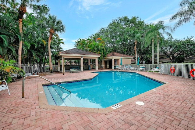 9715 NW 23rd Ct, Pembroke Pines, FL 33024 - community pool with a gazebo and a patio
